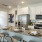 a kitchen with a marble counter top