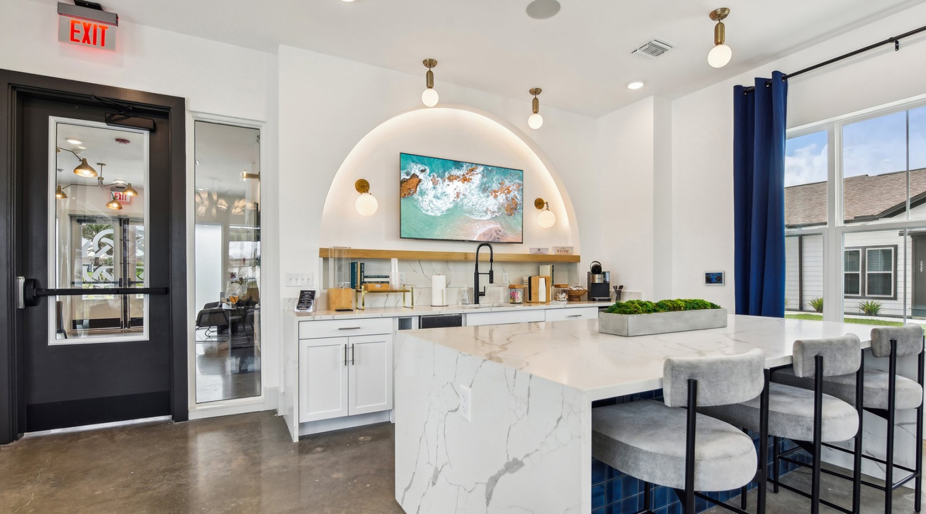 Love where you live large kitchen with tv and island with seating
