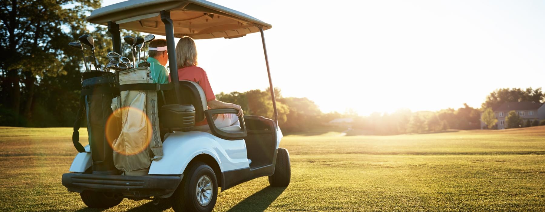 a golf cart with people in it