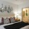 a bedroom with a large mirror