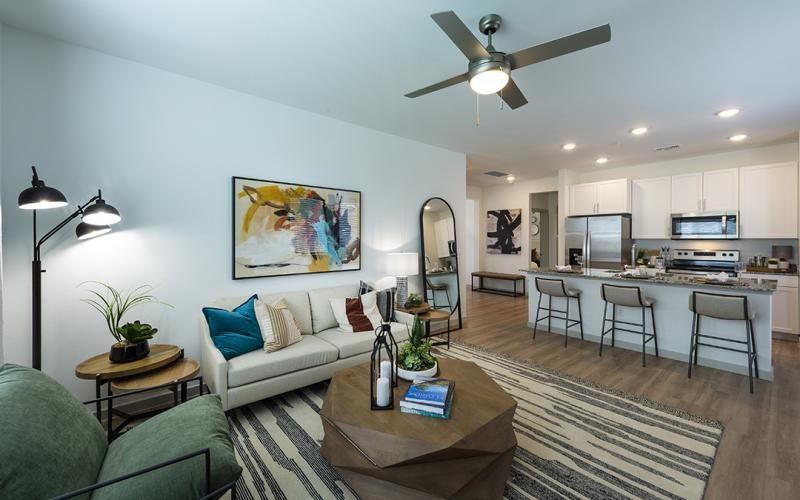 a living room with a couch and coffee table